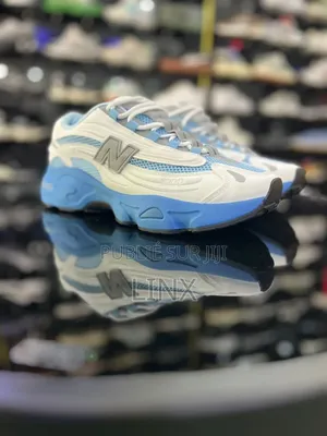 New Balance 1000 Blue Payement À La Réception