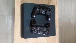PS4 Slim 500 Go + DualShock 4 Officielle - Très Bon État